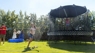 Load image into Gallery viewer, Kids playing around a trampoline with sun shade