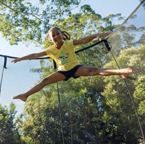 Straddle jump on a Springfree Trampoline